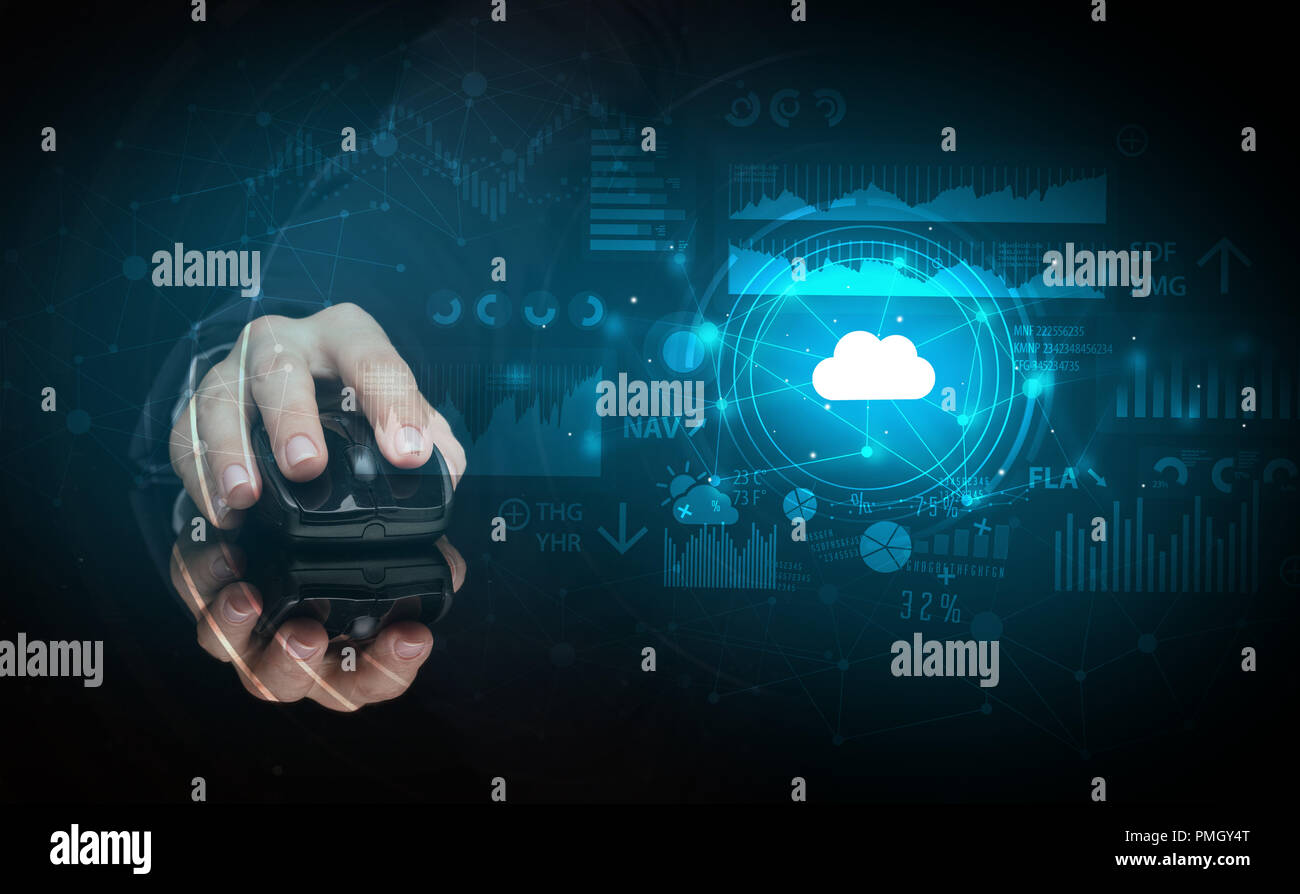 Hand using wireless mouse with cloud technology concept and dark background Stock Photo