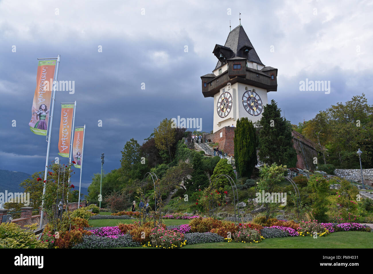 Graz, Austria - August 30, 2018 Schlossberg garden and Uhrturm Stock Photo