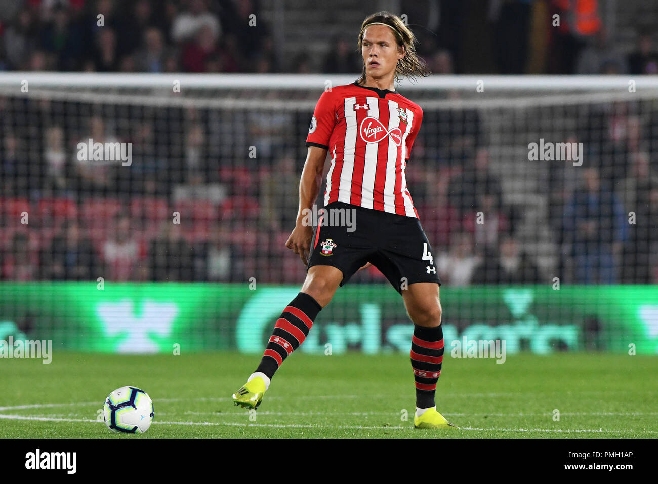 Jannik Vestergaard of Southampton - Southampton v Brighton & Hove Albion, Premier League, St Mary's Stadium, Southampton - 17th September 2018  STRICTLY EDITORIAL USE ONLY - DataCo rules apply - The use of this image in a commercial context is strictly prohibited unless express permission has been given by the club(s) concerned. Examples of commercial usage include, but are not limited to, use in betting and gaming, marketing and advertising products. No use with unauthorised audio, video, data, fixture lists, club and or league logos or services including those listed as 'live' Stock Photo