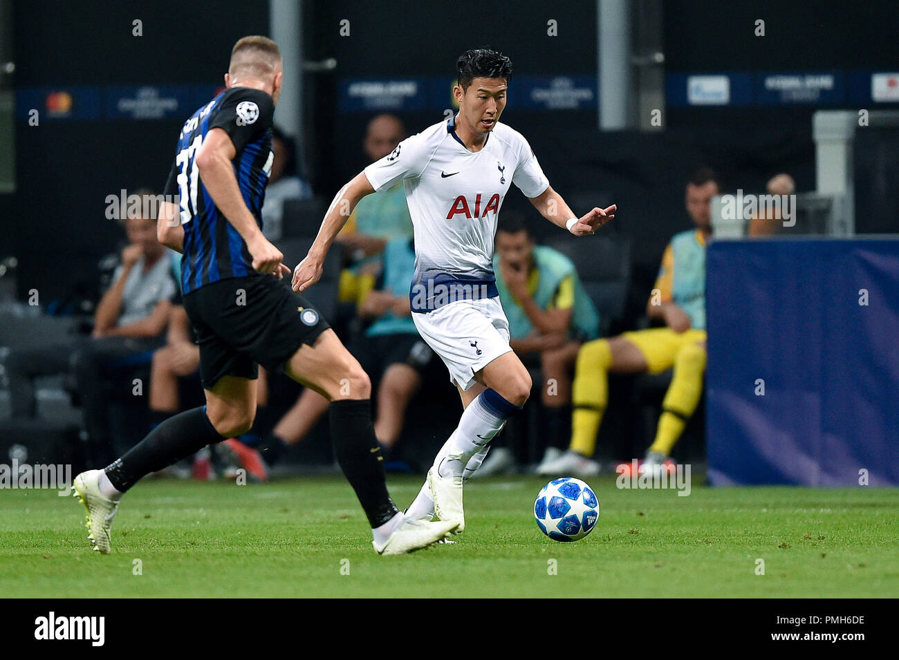 Milan, Italy. 18th September 2018. September 18, 2018 - Son Heung-Min of Tottenham  Hotspur and Milan Skriniar of Inter Milan fight for the ball during the  UEFA Champions League Group B match, image size:1300x955