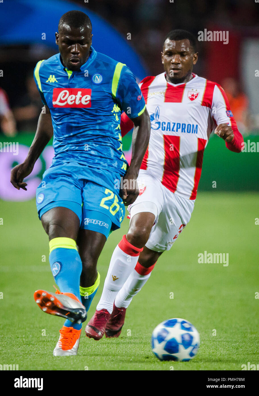 Belgrade, Serbia. 18th Sep, 2018. Crvena Zvezda's El Fardou Ben Nabouhane  (R) vies with Napoli's Raul Albiol during a UEFA Champions League group C  match between Crvena Zvezda and Napoli in Belgrade