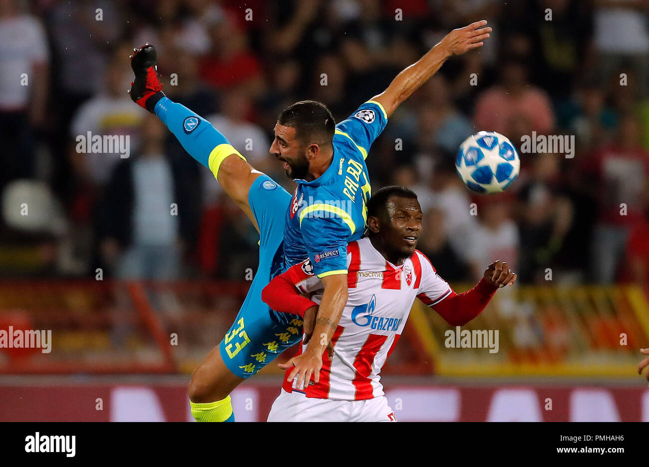 Belgrade, Serbia. 18th Sep, 2018. Crvena Zvezda's El Fardou Ben Nabouhane  (R) vies with Napoli's Raul Albiol during a UEFA Champions League group C  match between Crvena Zvezda and Napoli in Belgrade