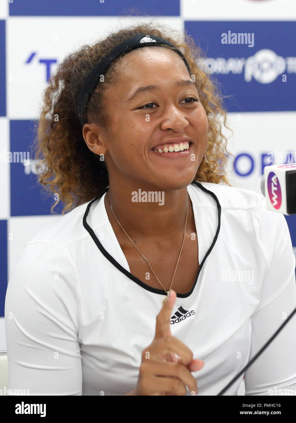 Naomi Osaka attends post match interview during WTA Toray PPO Tennis