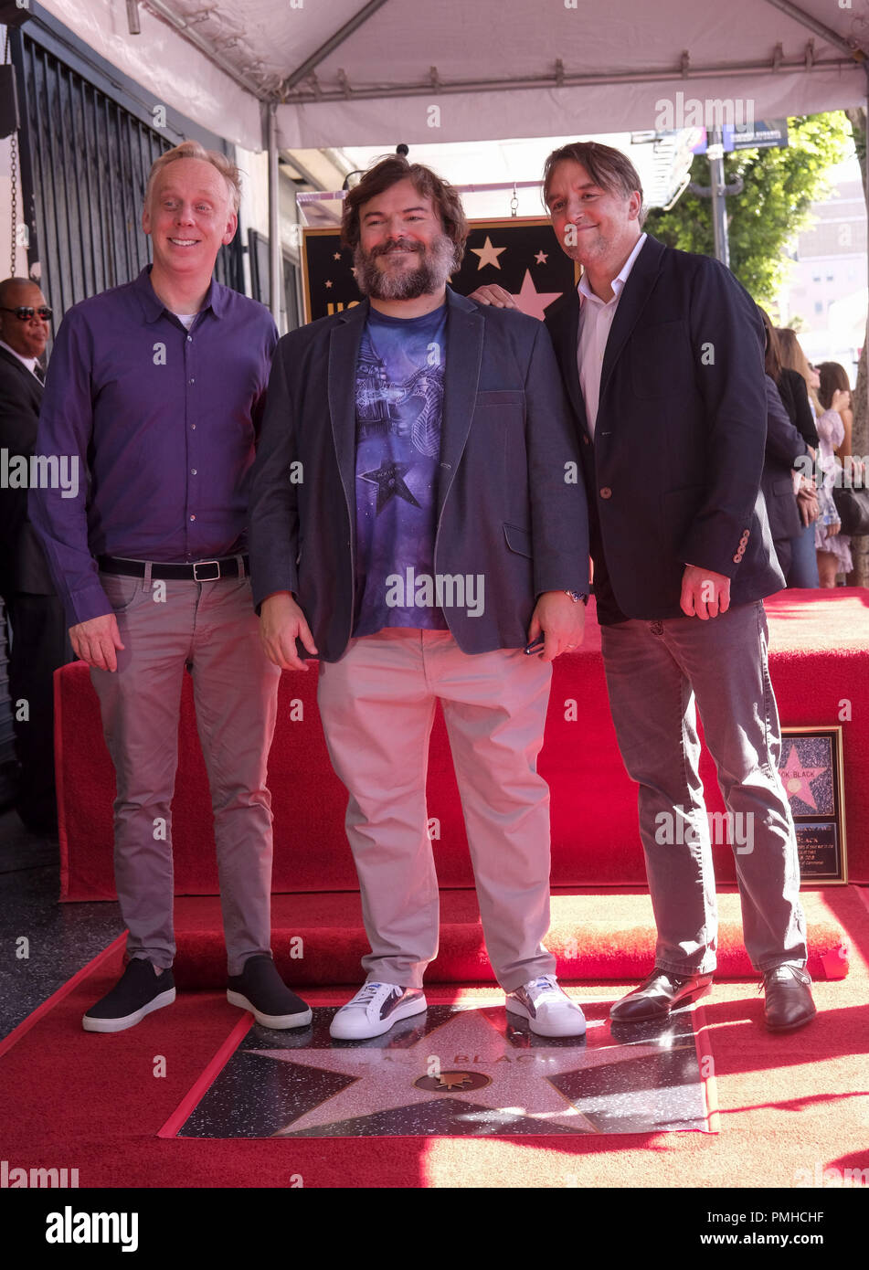 Los Angeles, California, USA. 18th Sep, 2018. Actor Jack Black, center,  poses with Mike White, left, and Richard Linklater during his star ceremony  on the Hollywood Walk of Fame Star where he