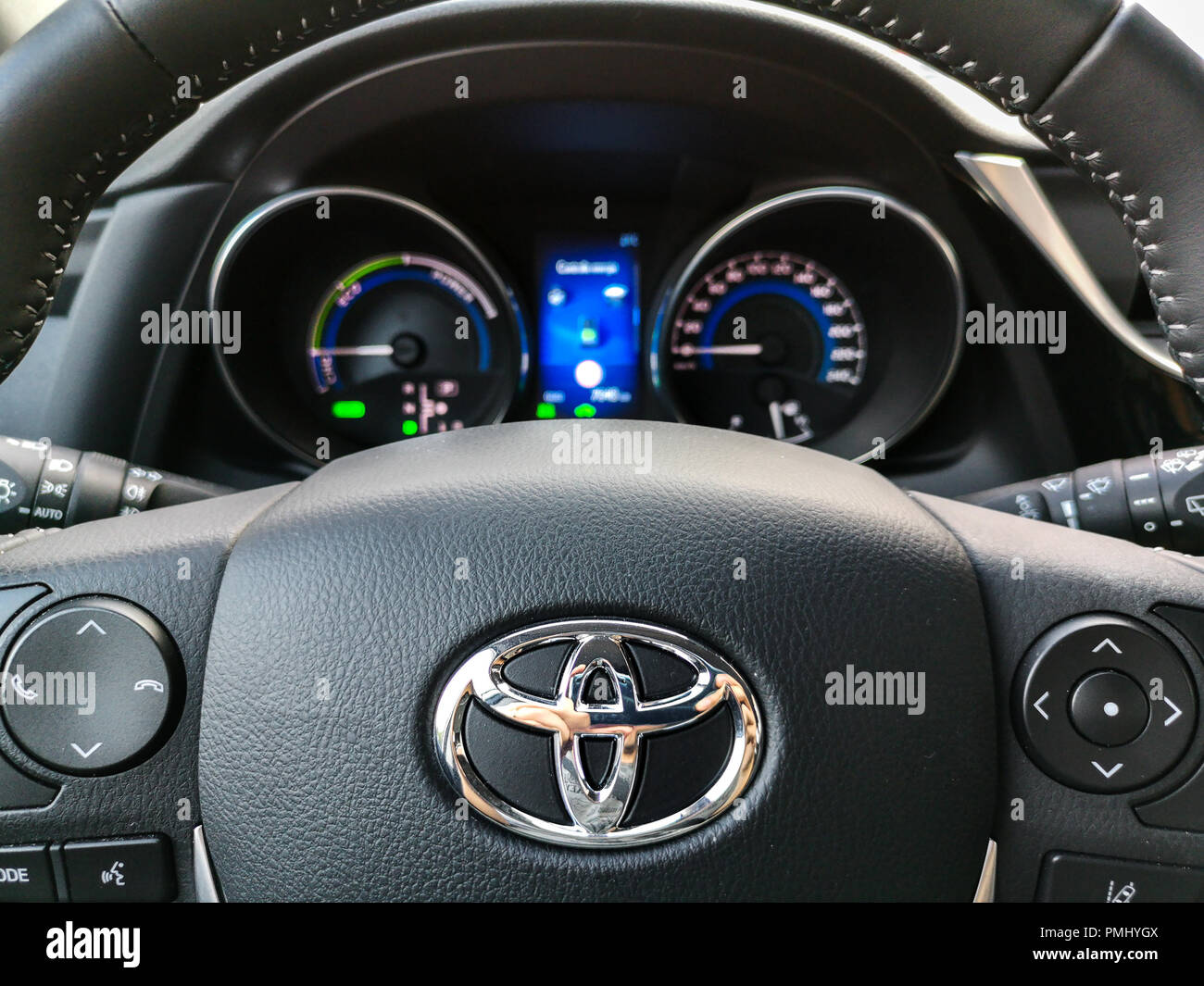 toyota steering wheel controls and car dashboard Stock Photo - Alamy