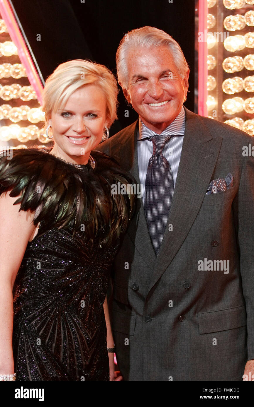 George Hamilton and Barbara Sturm at the Premiere of Screen Gems' 'Burlesque'. Arrivals held at Grauman's Chinese Theater in Hollywood, CA, November 15, 2010. Photo by Joseph Martinez / PictureLux File Reference # 30704 243PLX   For Editorial Use Only -  All Rights Reserved Stock Photo