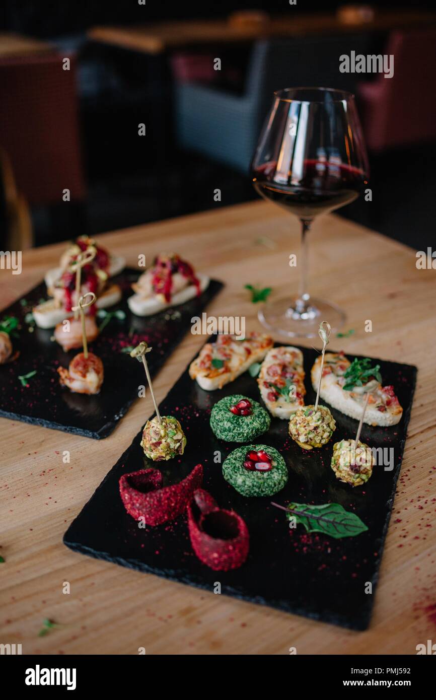 Appetizers with red wine Stock Photo Alamy