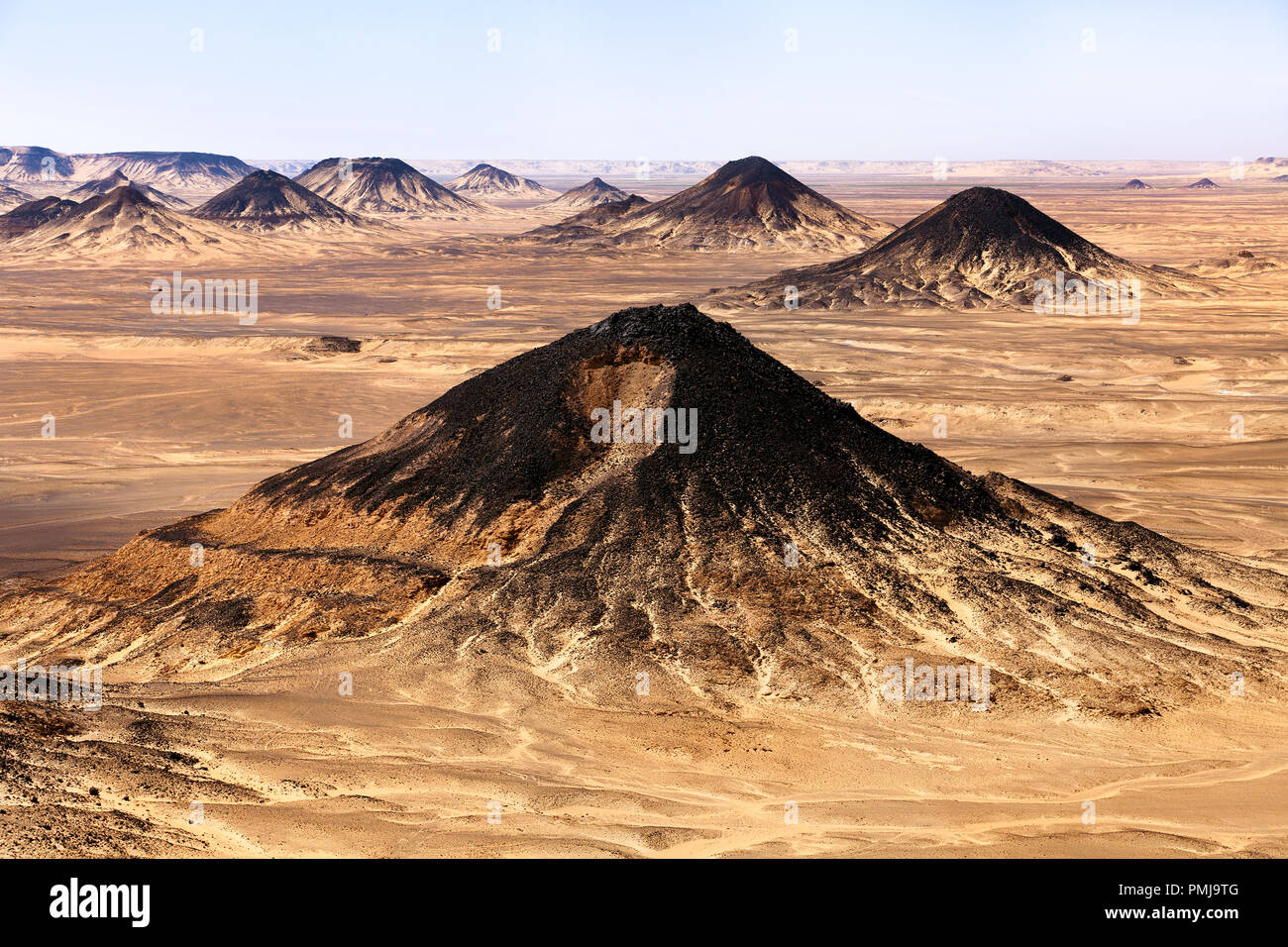 View of mountains of the Black Desert near Baharia oasis in the Sahara desert of central Egypt Stock Photo