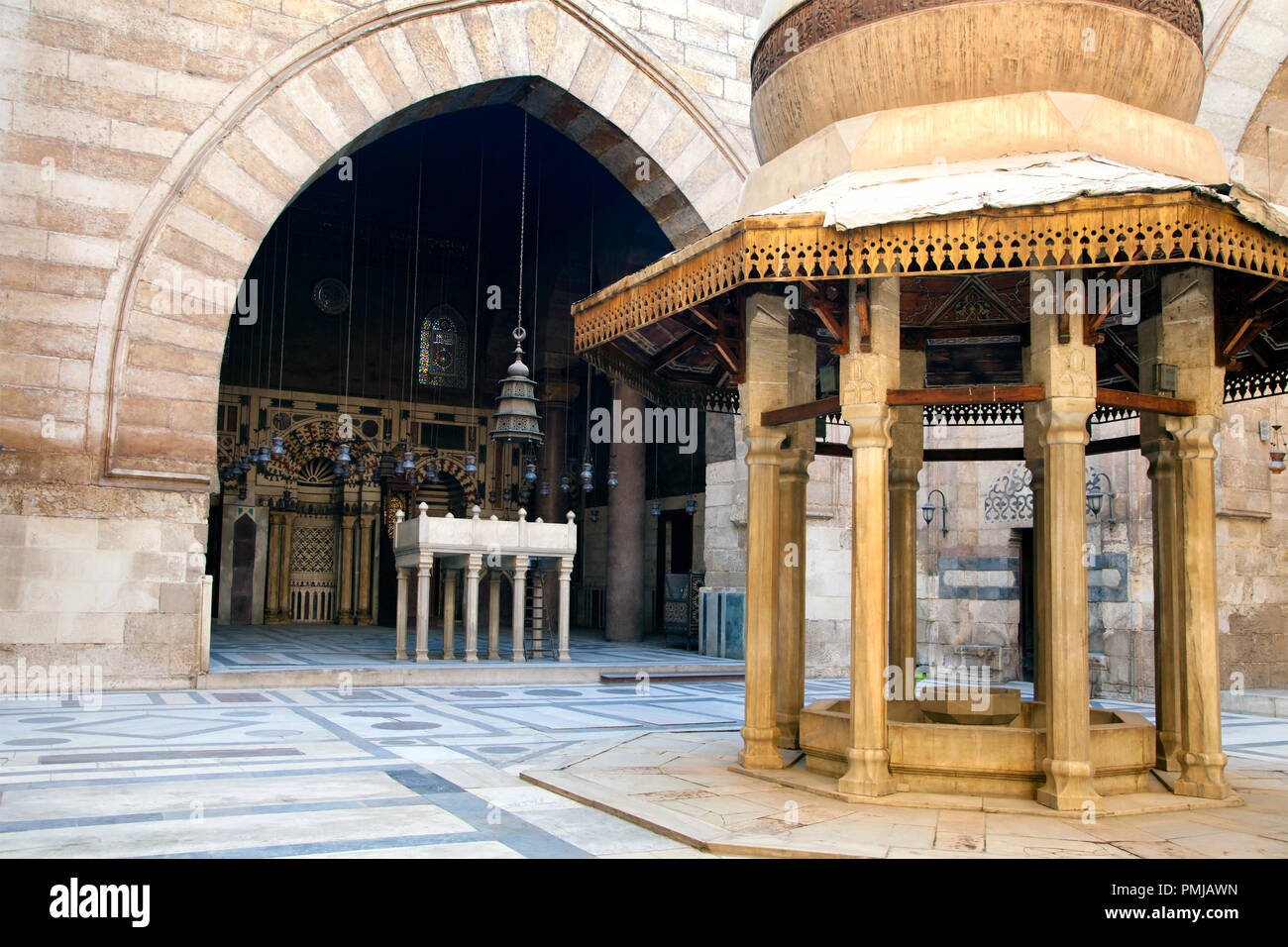 View of The ablution fountain in the courtyard of Al-Nasir Muhammad funerary complex on Al-Moez Street in the center of Cairo, Egypt Stock Photo
