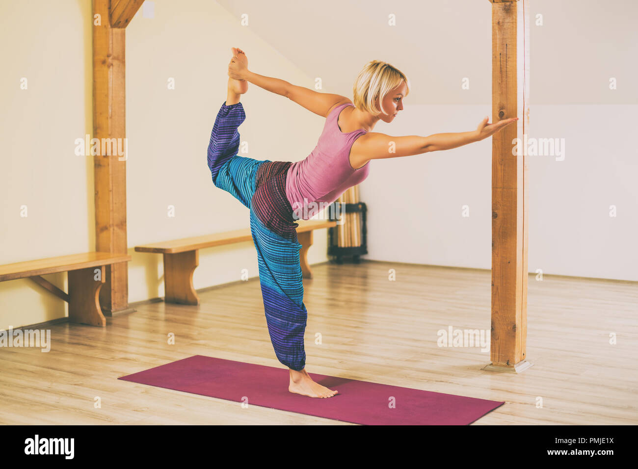 Beautiful Fitness Model Practices Yoga Or Pilates, Standing In  Natarajasana, Dancing Shiva Pose, Three Quarters View, Studio Shot,  Isolated Stock Photo, Picture and Royalty Free Image. Image 39845477.