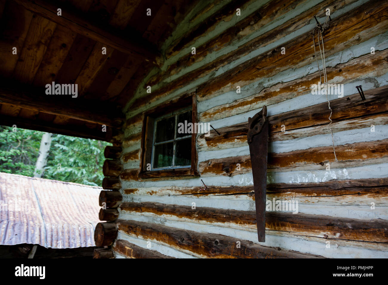 A log cabin in the San Juan National Forest serves as a shelter for those hiking in the forest or in need of emergency shelter. Stock Photo