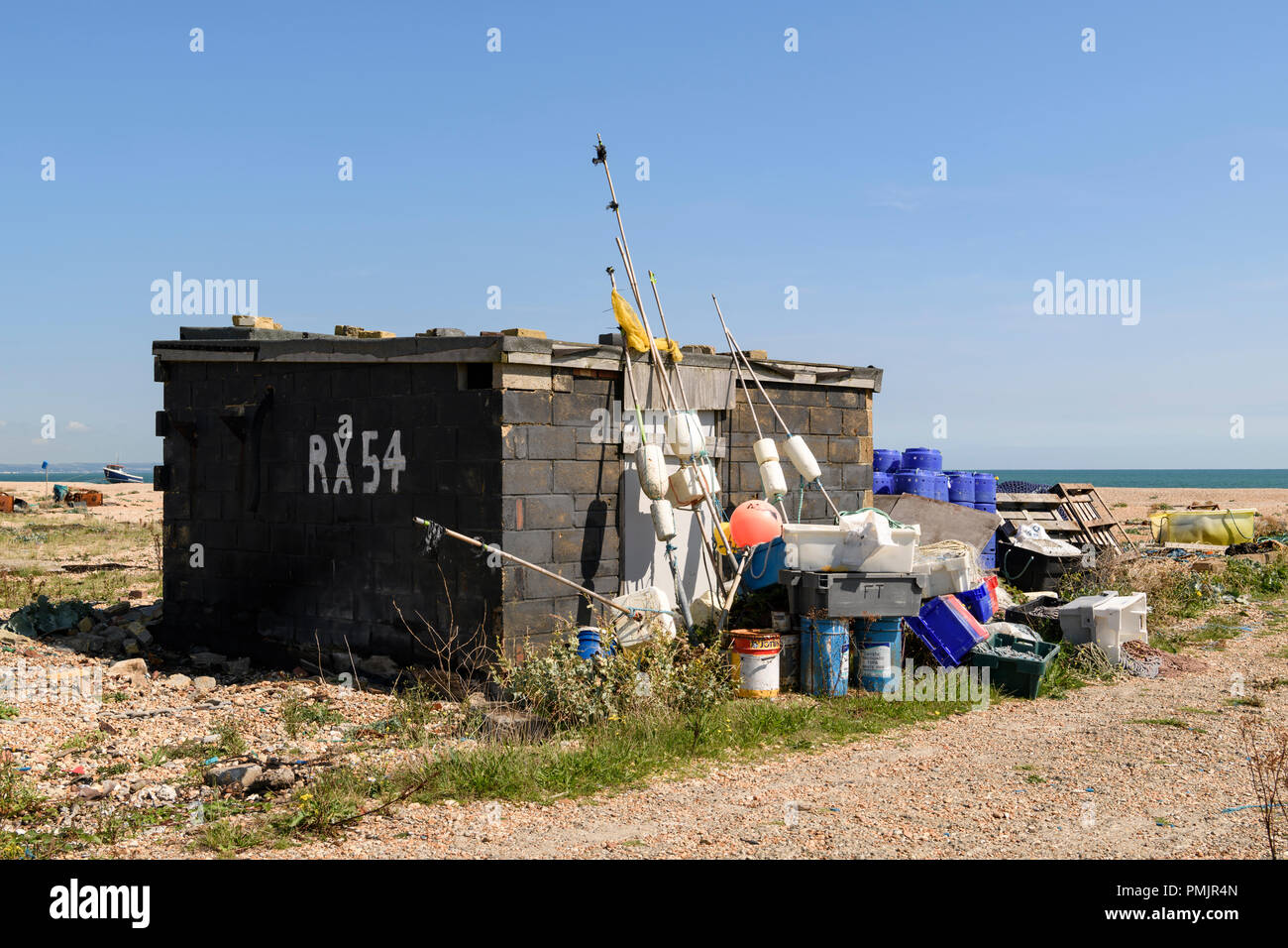 A fishermans storage building and some equipment at Dungeness, Kent, England. 31 August 2018 Stock Photo