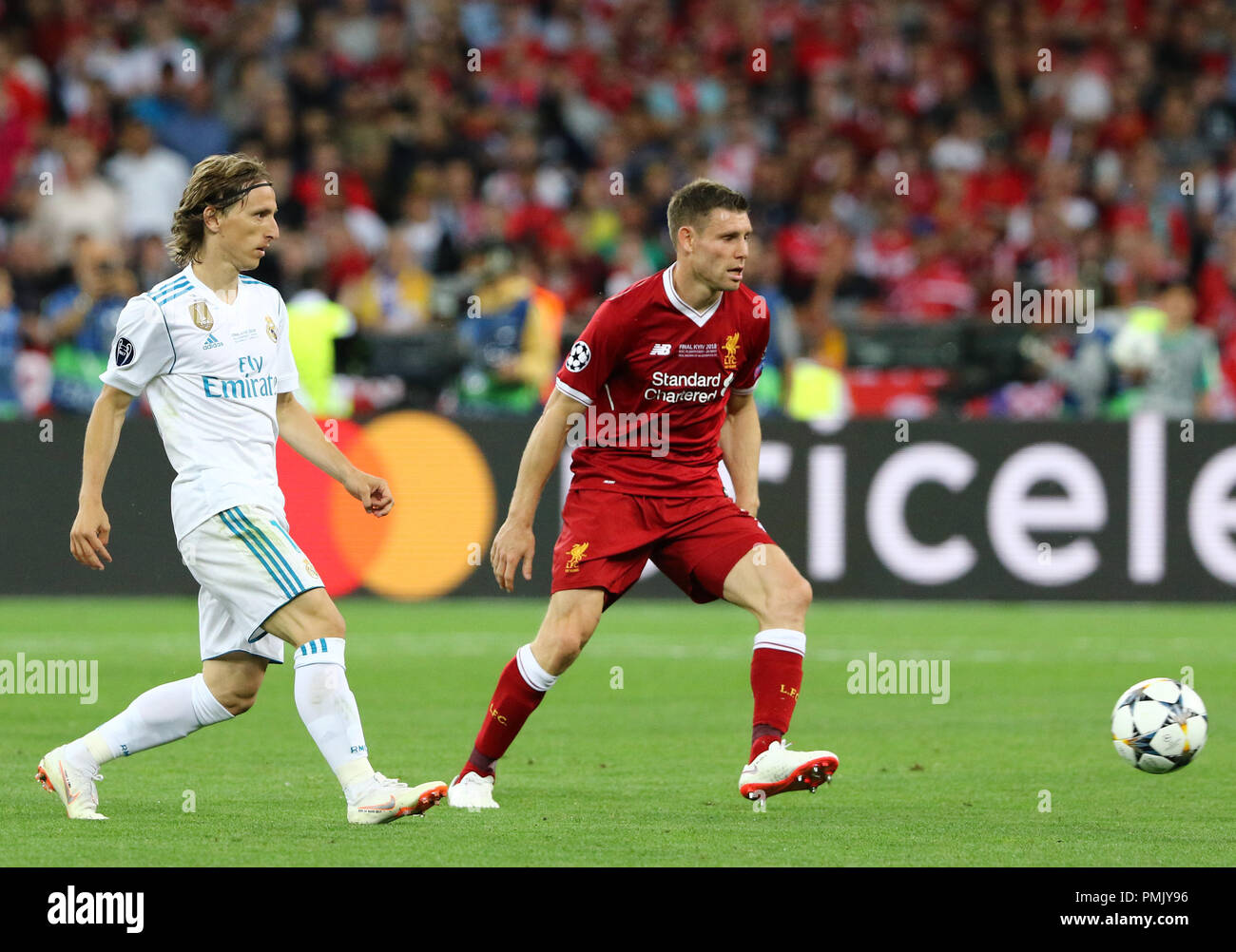 KYIV, UKRAINE - MAY 26, 2018: Luka Modric of Real Madrid (L) fights for a ball with James Milner of Liverpool during their UEFA Champions League Final Stock Photo