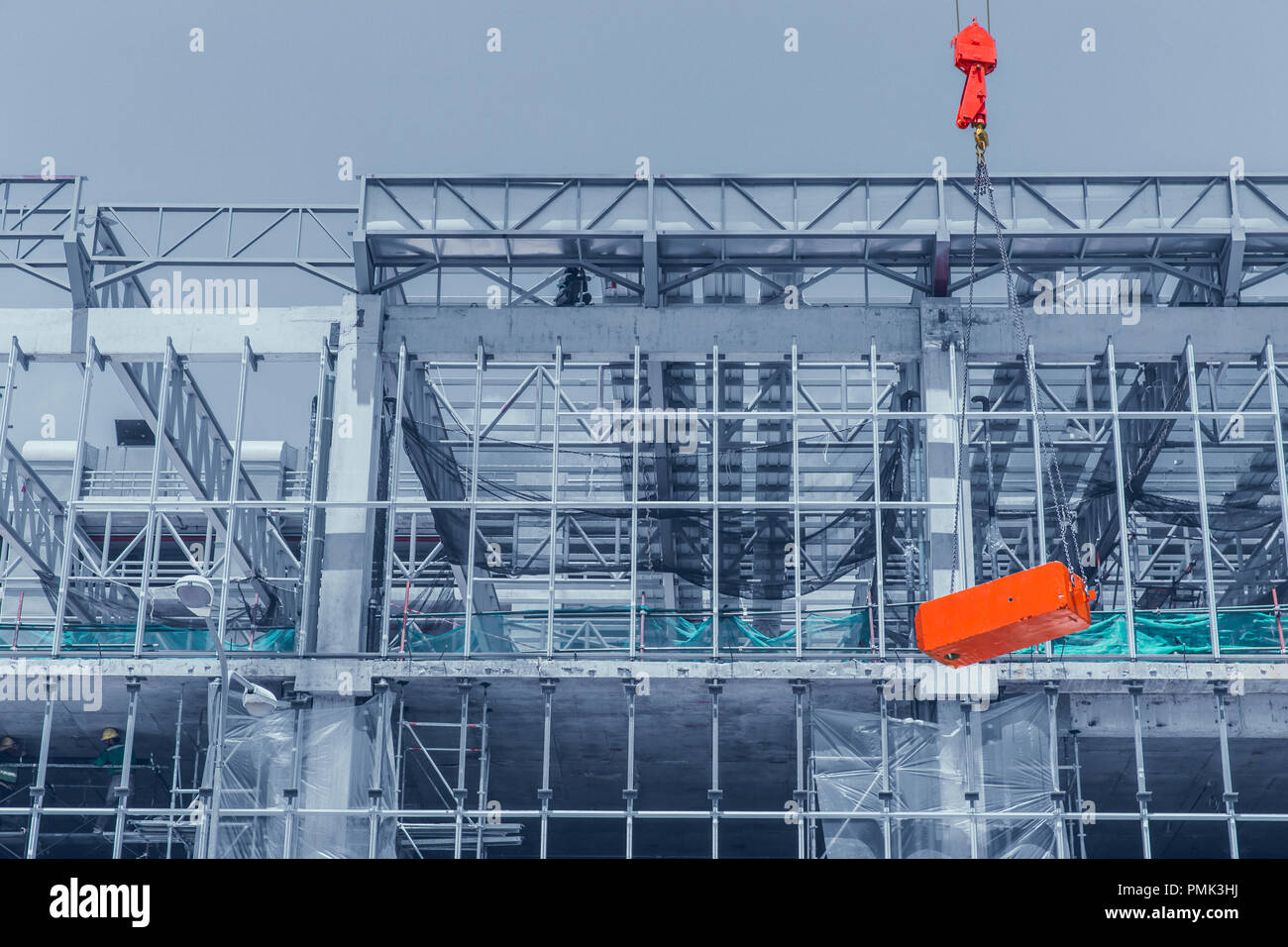 Large high crane hoist Industrial building construction Stock Photo