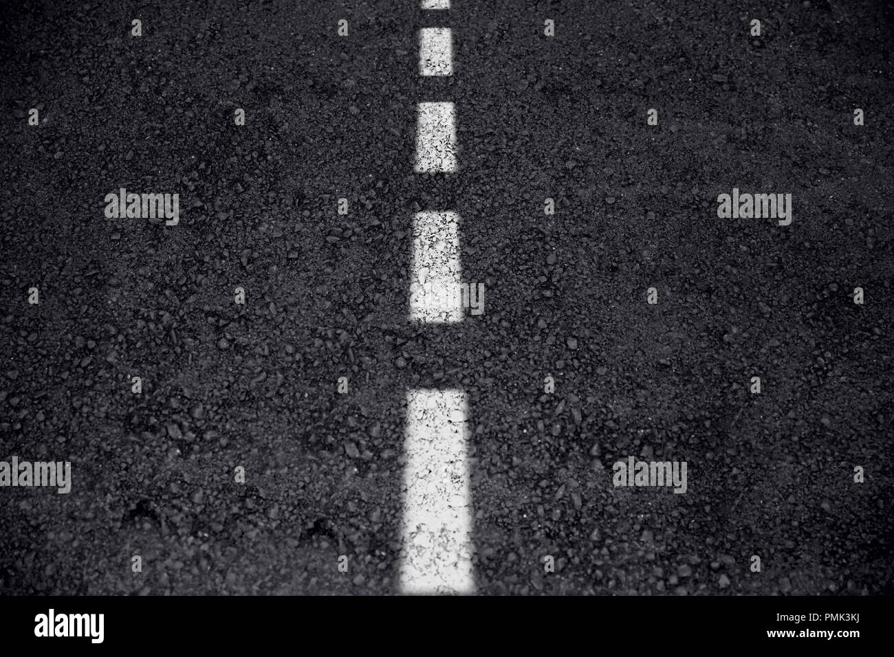 asphalt road center white line two ways on freeway or highway texture background Stock Photo