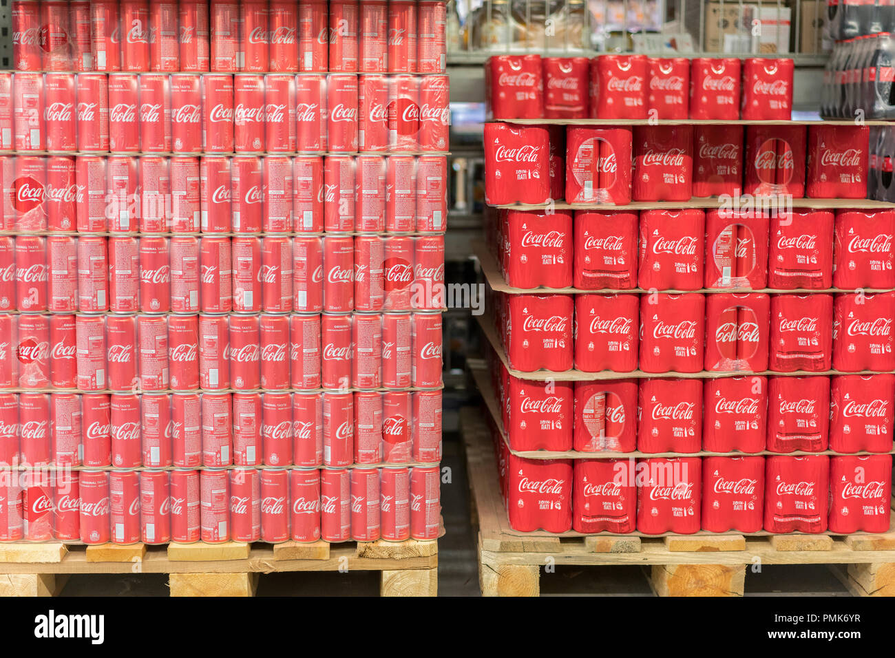 Kiev, Ukraine. August 28 2018. Coke in bottles on row of shelf display