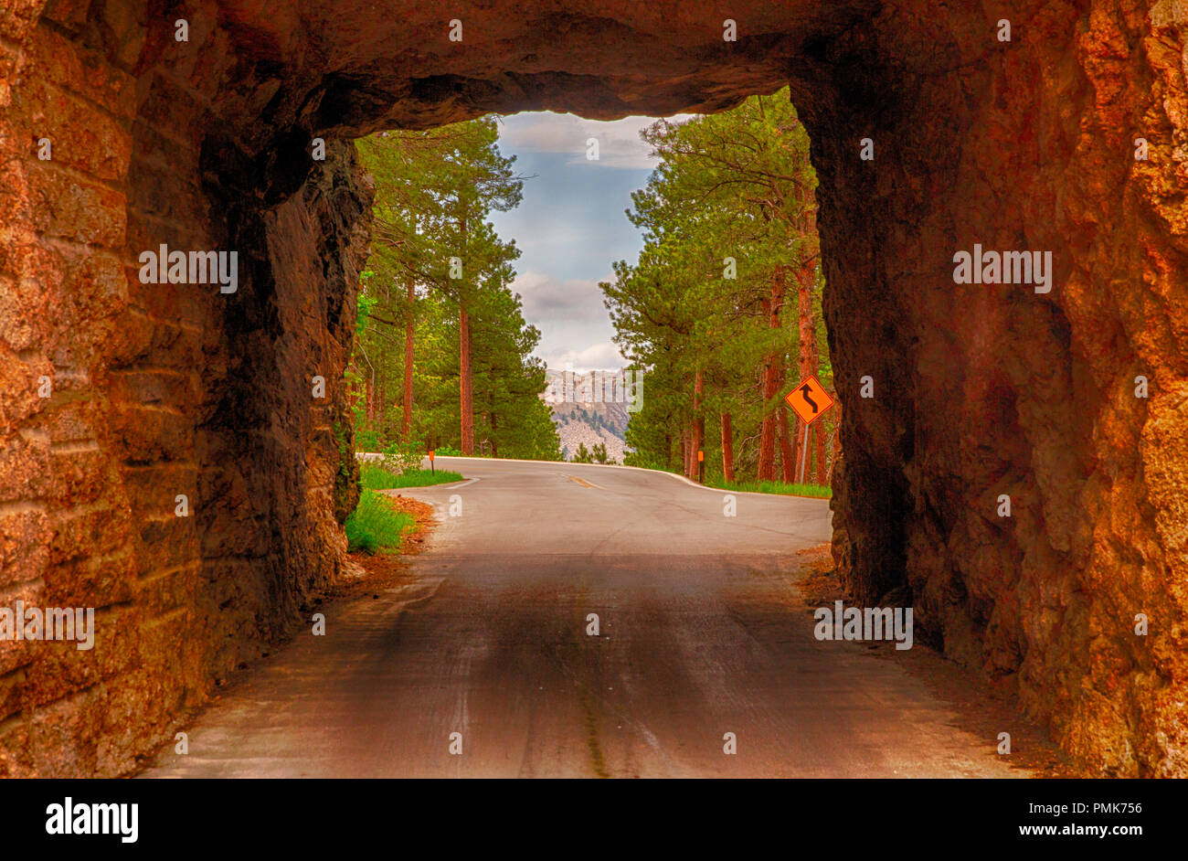 Mount Rushmore as seen from a tunnel on the iron mountain road Stock