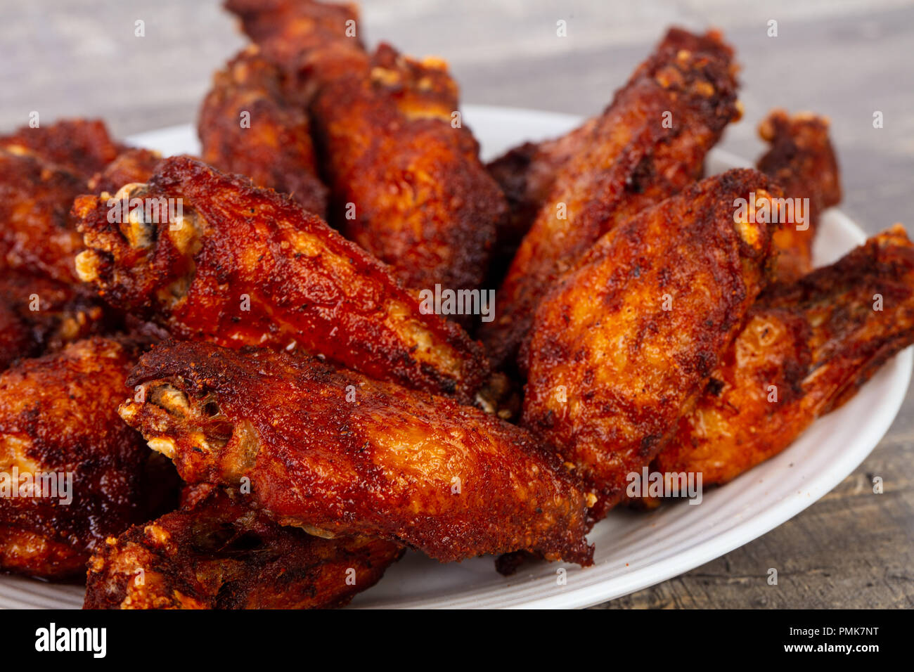 Chicken BBQ wings with spicy sauce Stock Photo - Alamy