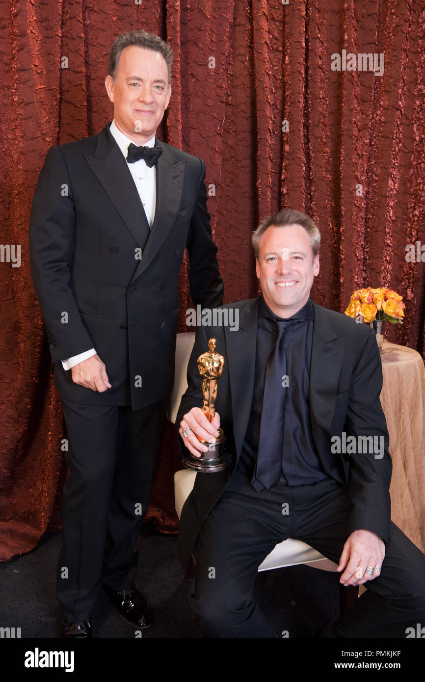 Oscar-winning art director, Robert Stromberg for Production Design poses backstage with presenter, Tom Hanks, during the 83rd Annual Academy Awards broadcast by the ABC Television Network from the Kodak Theatre in Hollywood, CA Sunday, February 27, 2011.  File Reference # 30871 401  For Editorial Use Only -  All Rights Reserved Stock Photo