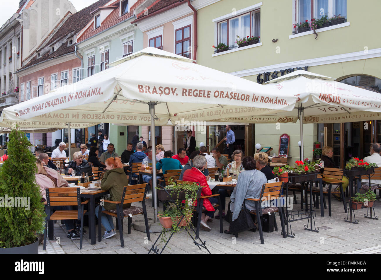 Café in the main square of the old town in Brasov, Romania Stock Photo
