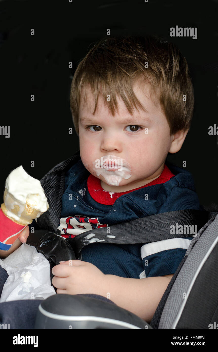 Messy toddler with ice cream cone Stock Photo Alamy