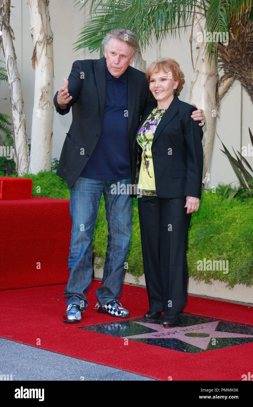 Gary Busey and Maria Elena Holly at the Hollywood Chamber of Commerce ceremony to posthumously honor Buddy Holly with a star on the Hollywood Walk of Fame in Hollywood, CA, September 7, 2011. Photo by Joe Martinez / PictureLux Stock Photo