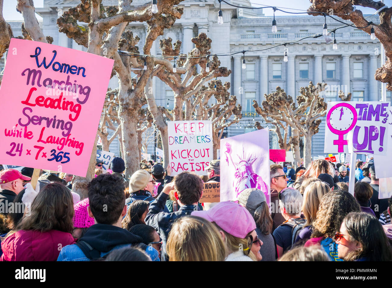 January 20, 2018 San Francisco / CA / USA - Various raised signs at the Women's March rally taking place in the Civil Center Plaza Stock Photo