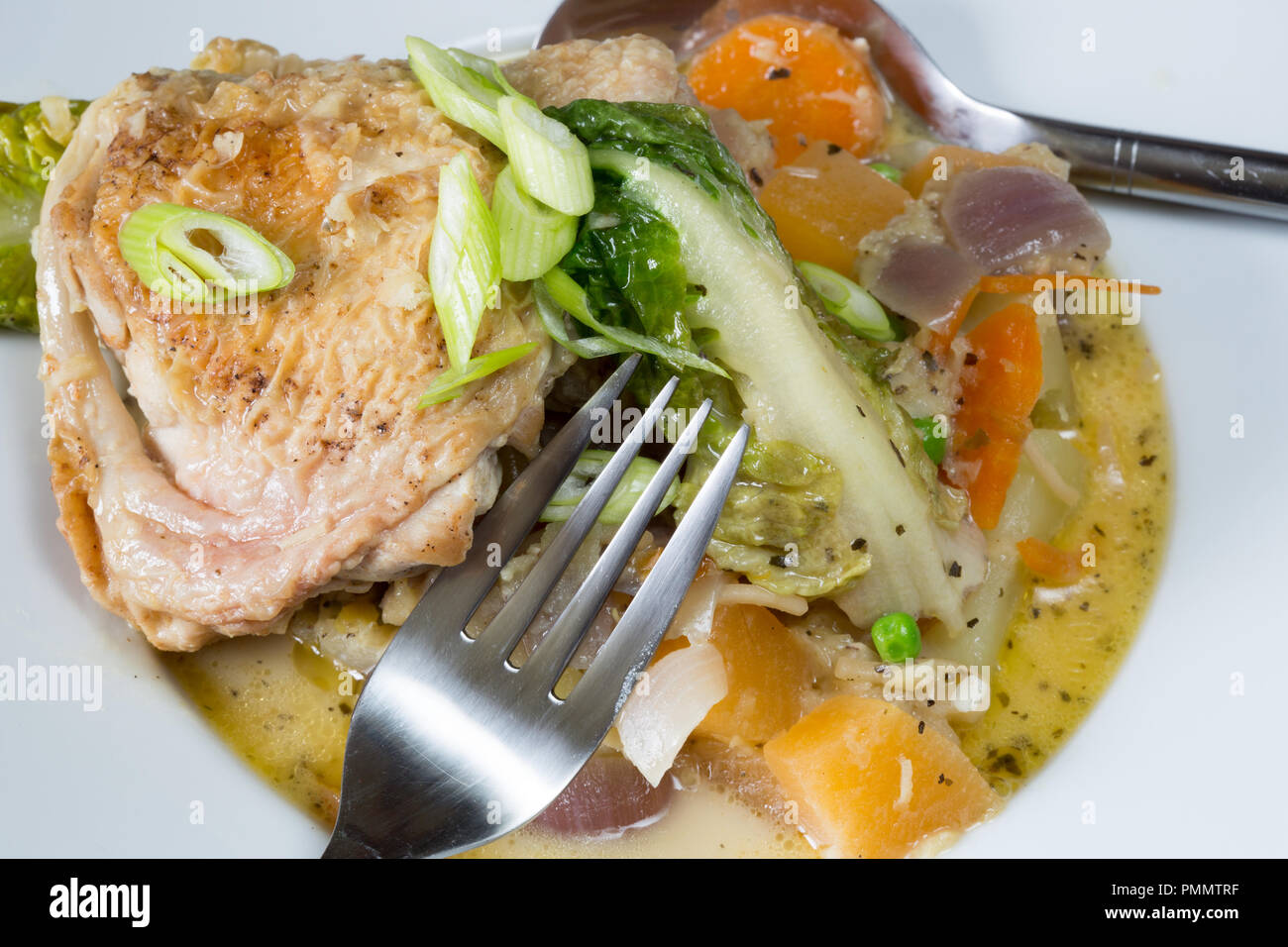Braised Chicken and vegetable casserole. Stock Photo