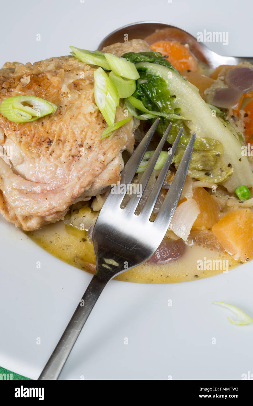 Braised Chicken and vegetable casserole. Stock Photo