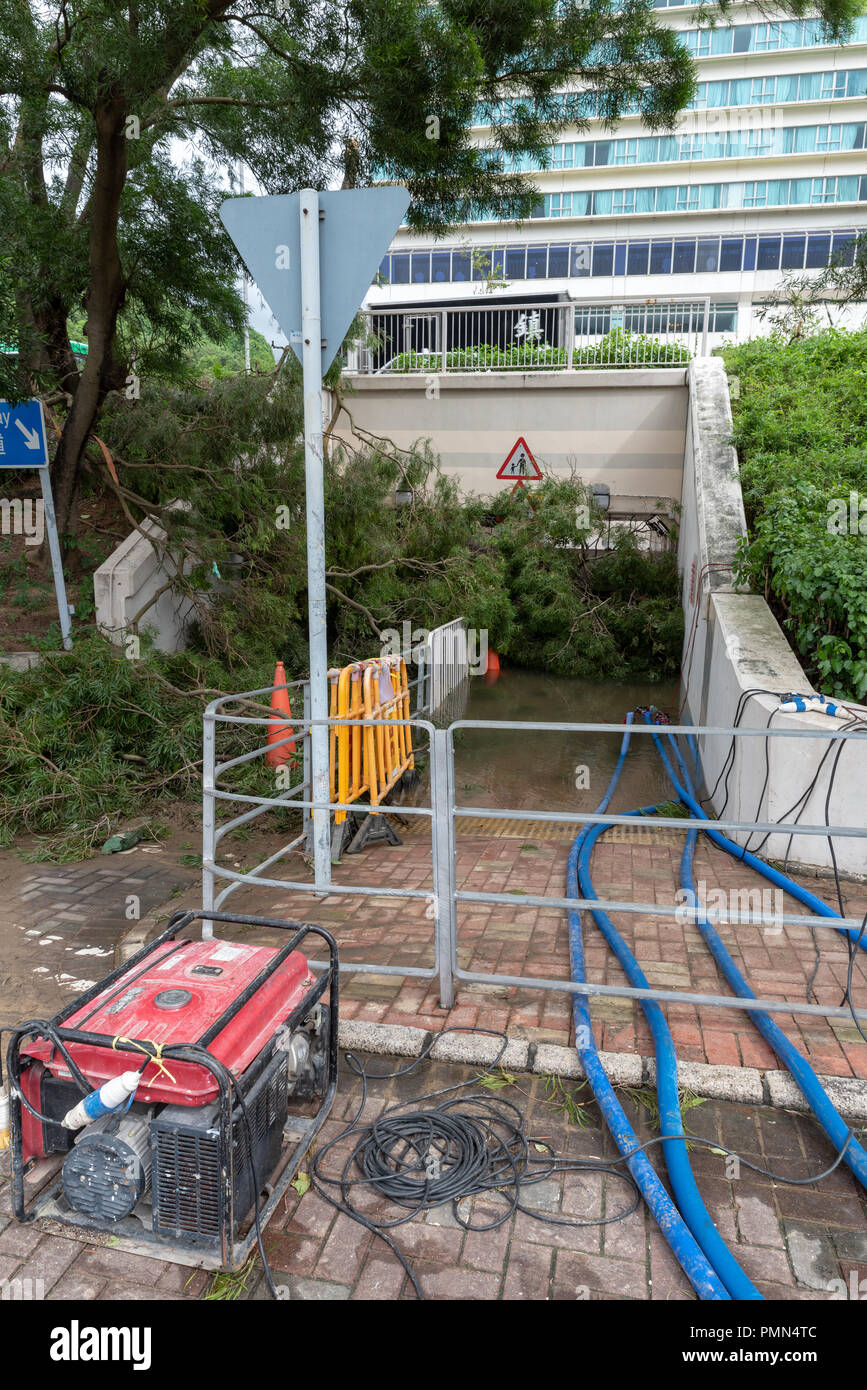 HONG KONG, SEP 17, 2018: Pumping water out from a flooded tunnel, after Super Typhoon Mangkhut hit Hong Kong Stock Photo