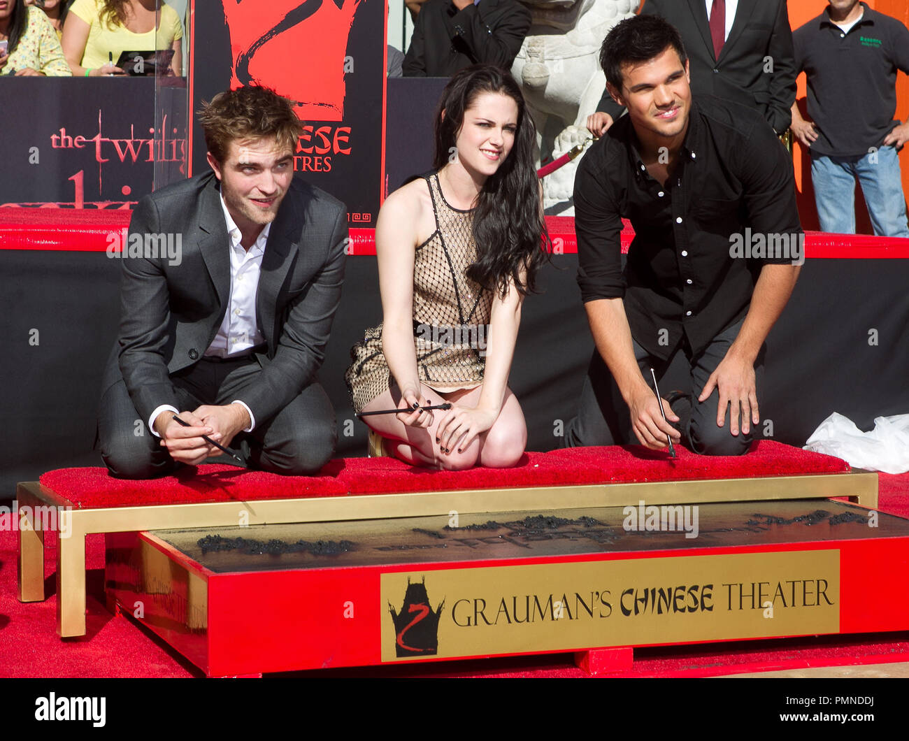 Robert Pattinson, Kristen Stewart & Taylor Lautner at the 'Twilight' Trio Robert Pattinson, Kristen Stewart and Taylor Lautner Hand And Footprint Ceremony held at Grauman's Mann Chinese Theatre in Hollywood, CA. The event took place on Thursday, November 3, 2011. Photo by John Salangsang/ PRPP/ PictureLux Stock Photo
