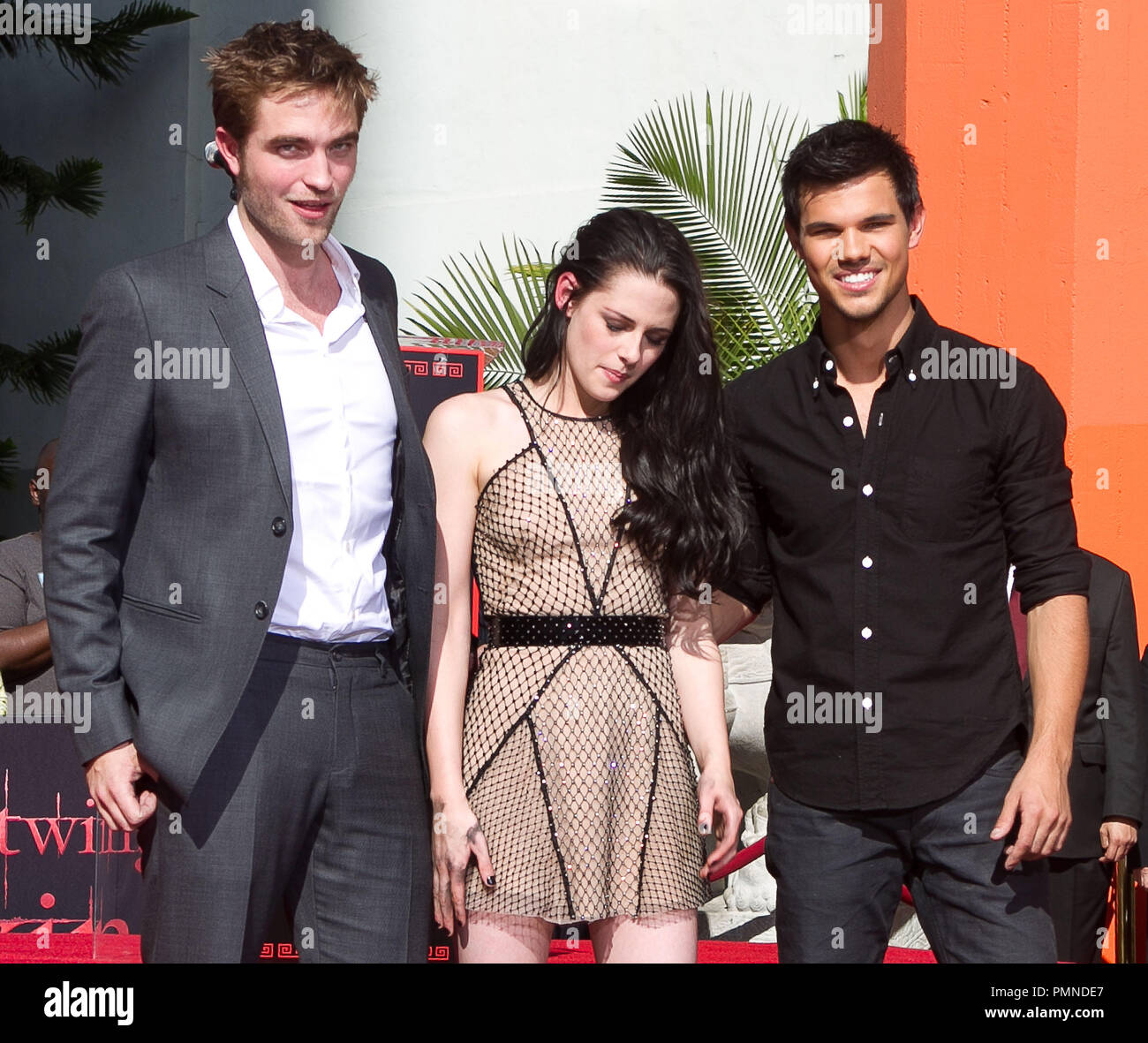 Robert Pattinson, Kristen Stewart & Taylor Lautner at the 'Twilight' Trio Robert Pattinson, Kristen Stewart and Taylor Lautner Hand And Footprint Ceremony held at Grauman's Mann Chinese Theatre in Hollywood, CA. The event took place on Thursday, November 3, 2011. Photo by John Salangsang/ PRPP/ PictureLux Stock Photo