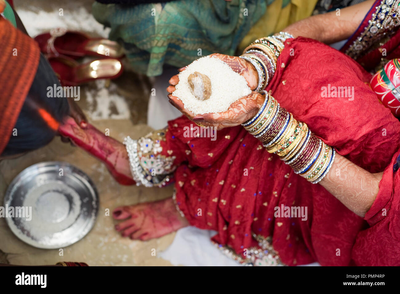 North Indian Wedding Traditional Ceremony Bride Holding Rice In