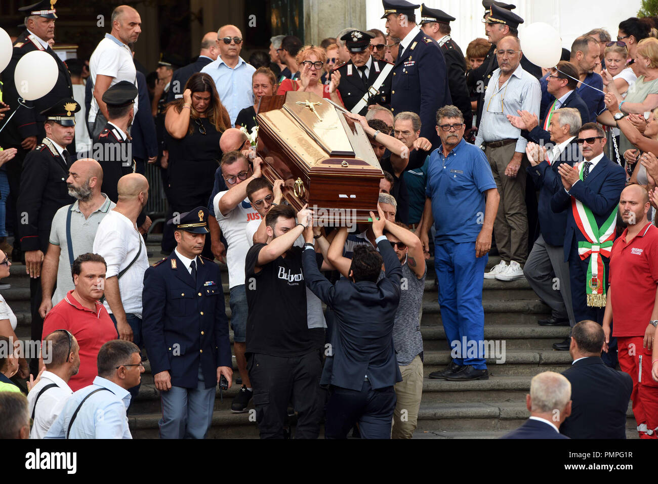 The funerals of Giovanni Battiloro, Matteo Bertonati, Gerardo Esposito and Antonio Stanzione, the four boys of Torre del Greco who died in the tragic collapse of the Morandi Bridge in Genoa on August 14, 2018. Their relatives have refused the State funeral and they decided to have their funerals in Torre del Greco, Italy.  Featuring: atmosphere Where: Torre del Greco, Campania, Italy When: 17 Aug 2018 Credit: IPA/WENN.com  **Only available for publication in UK, USA, Germany, Austria, Switzerland** Stock Photo