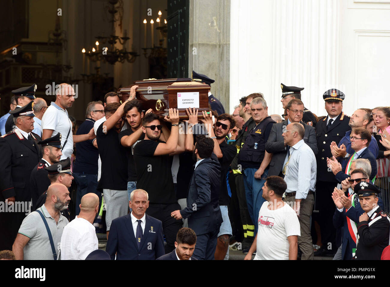 The funerals of Giovanni Battiloro, Matteo Bertonati, Gerardo Esposito and Antonio Stanzione, the four boys of Torre del Greco who died in the tragic collapse of the Morandi Bridge in Genoa on August 14, 2018. Their relatives have refused the State funeral and they decided to have their funerals in Torre del Greco, Italy.  Featuring: atmosphere Where: Torre del Greco, Campania, Italy When: 17 Aug 2018 Credit: IPA/WENN.com  **Only available for publication in UK, USA, Germany, Austria, Switzerland** Stock Photo