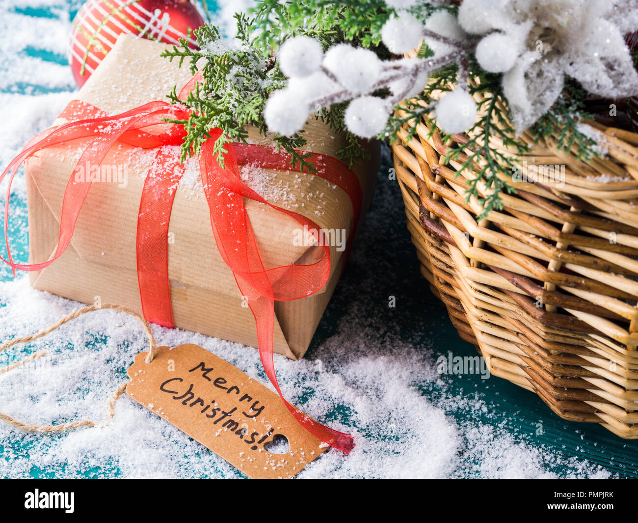 Merry Christmas Card With Hand Made Wrapped Gift With Red Ribbon