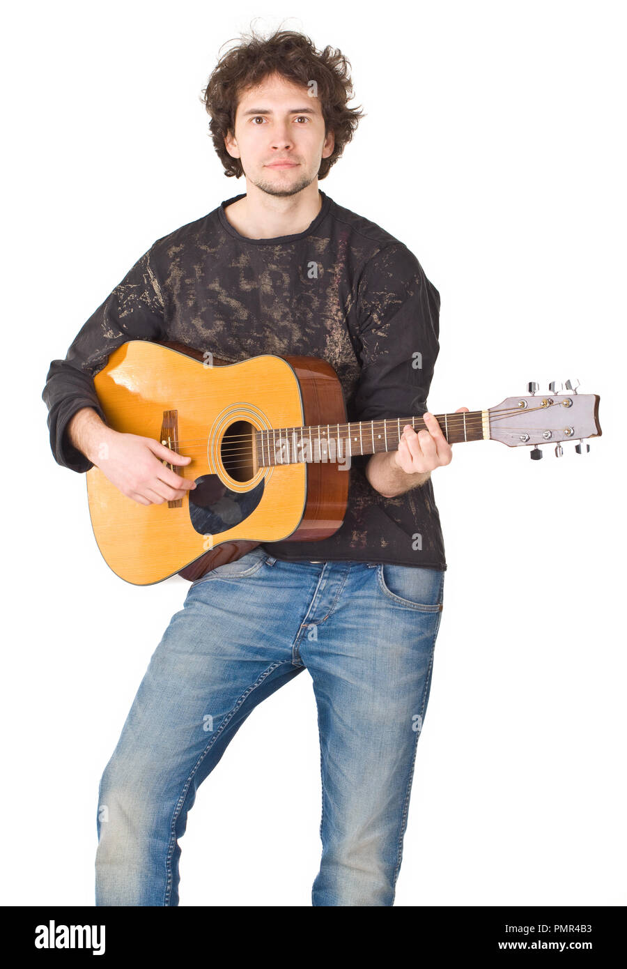 Nice young man playing on a gitare and posing to camera Stock Photo