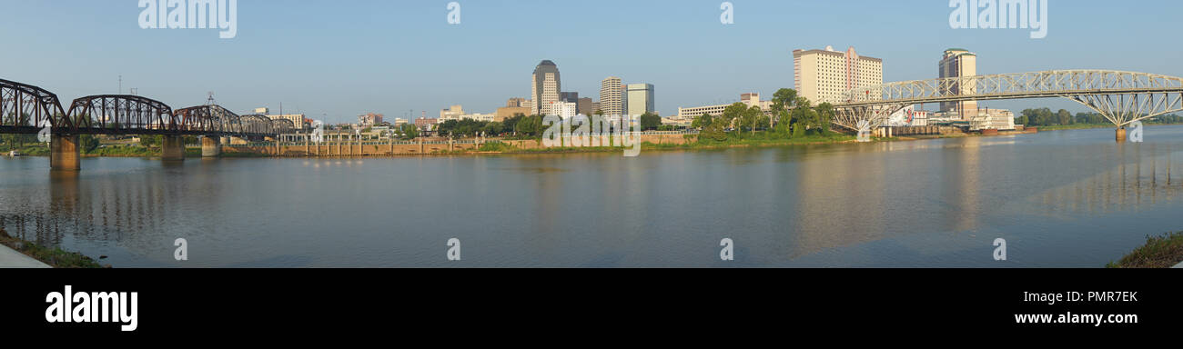 The Red River meanders by under bridges and by the waterfront in Shreveport Louisiana Stock Photo