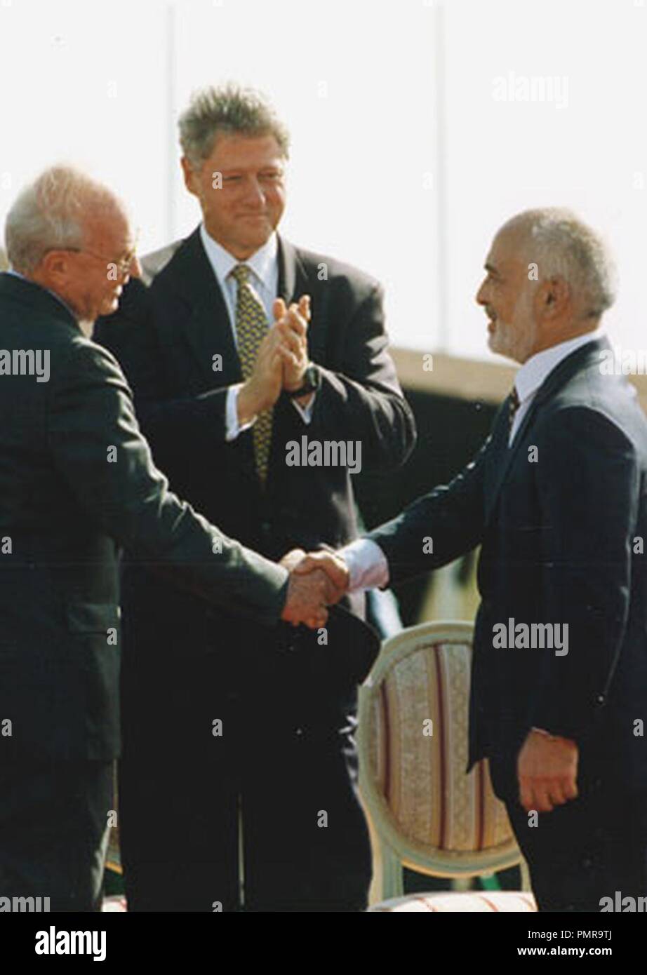 Bill Clinton Yitzhak Rabin and King Hussein I of Jordan at the peace treaty  signing ceremony Stock Photo - Alamy