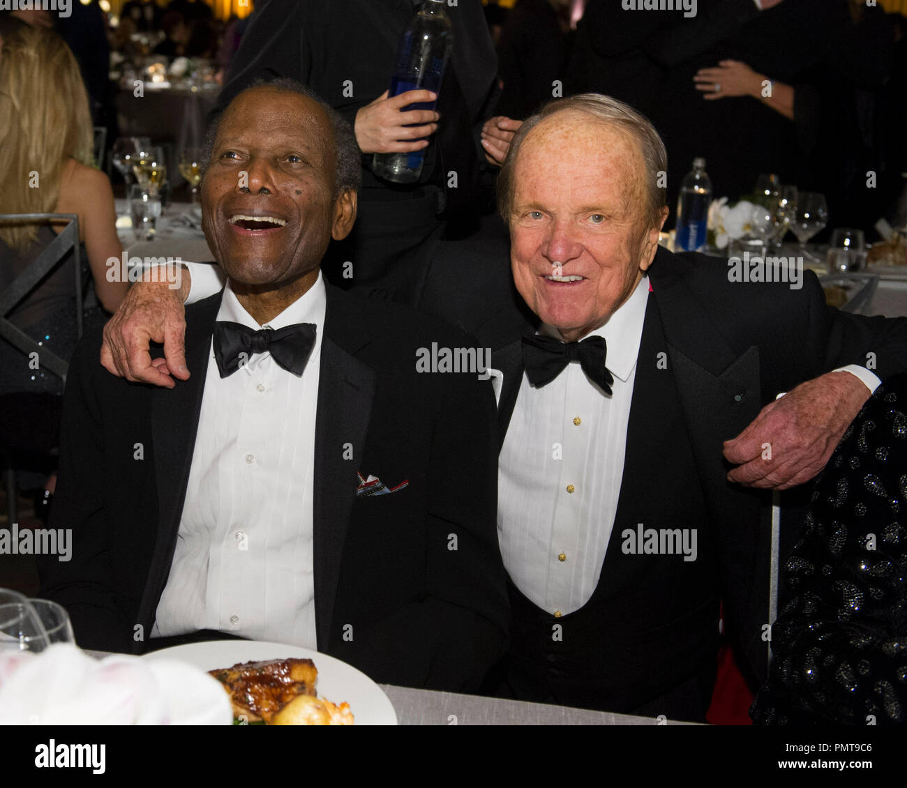 Oscar®-winning actor Sidney Poitier (left) and Honorary Award recipient George Stevens Jr. attend the 2012 Governors Awards at The Ray Dolby Ballroom at Hollywood & Highland Center® in Hollywood, CA, Saturday, December 1.  File Reference # 31744 044  For Editorial Use Only -  All Rights Reserved Stock Photo