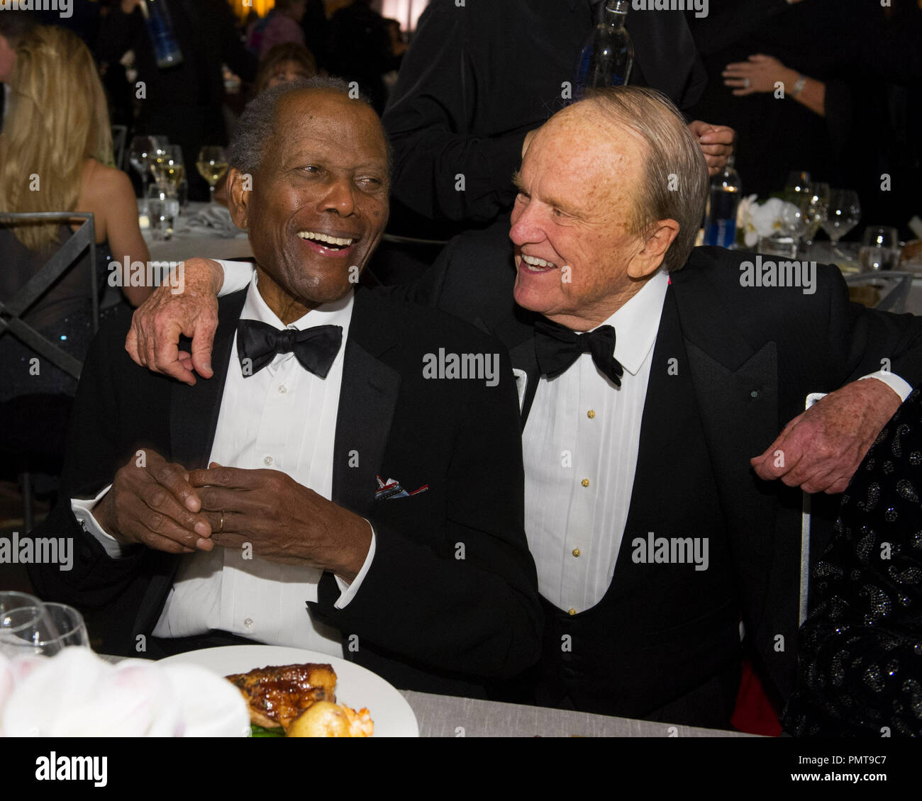 Oscar®-winning actor Sidney Poitier (left) and Honorary Award recipient George Stevens Jr. attend the 2012 Governors Awards at The Ray Dolby Ballroom at Hollywood & Highland Center® in Hollywood, CA, Saturday, December 1.  File Reference # 31744 045  For Editorial Use Only -  All Rights Reserved Stock Photo