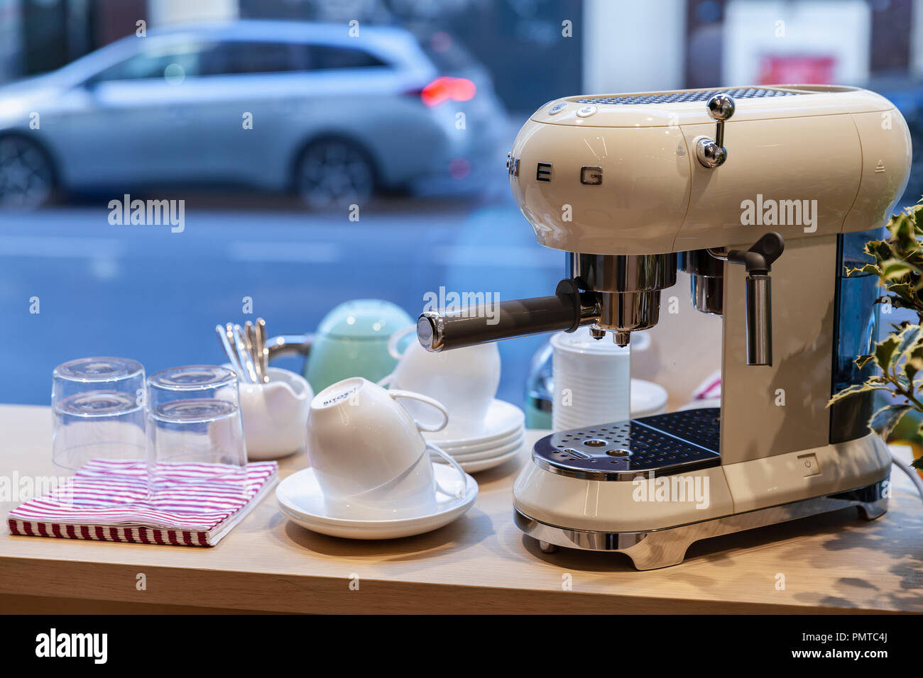 Milan, Italy - January 19, 2018: White Espresso Coffee maker by Smeg. It is an Italian manufacturer of upmarket domestic appliances Stock Photo