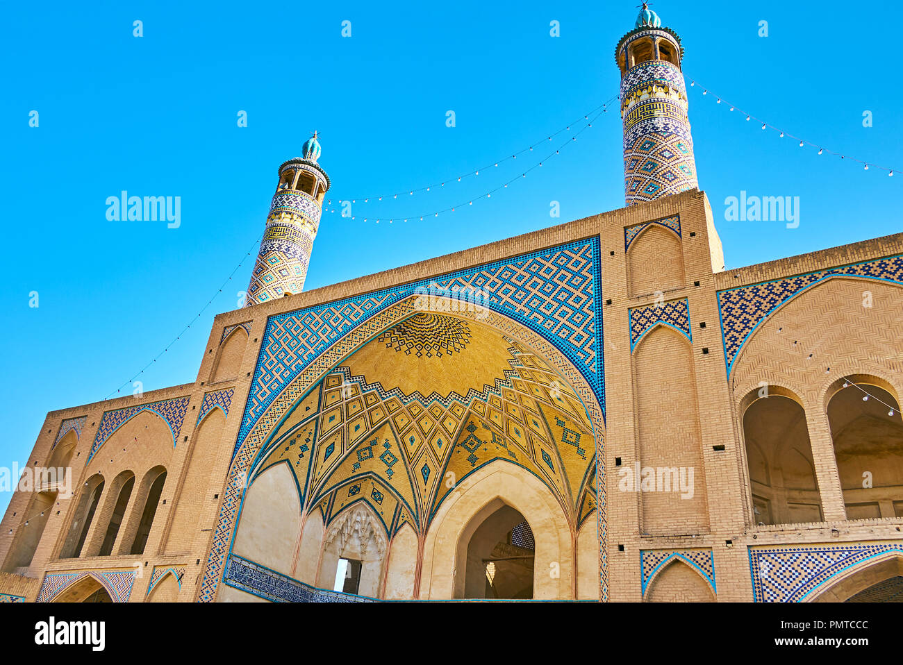 The picturesque portal of Agha mosque with intricate tile