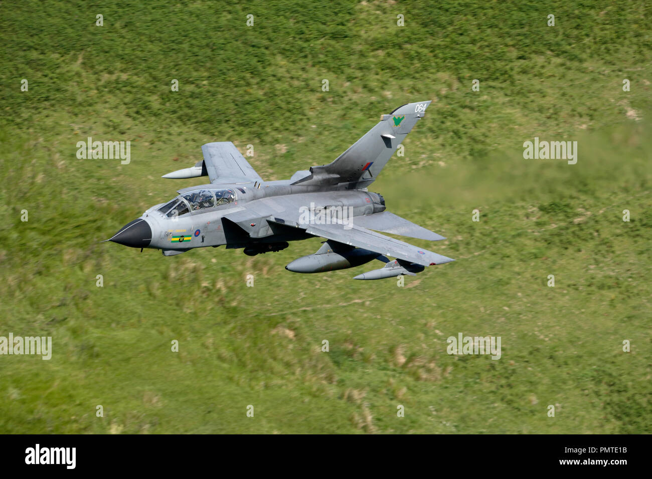 Royal Air Force Panavia Tornado GR4 flying low level in the Mach Loop military low level training area LFA7 Snowdonia, Wales Stock Photo