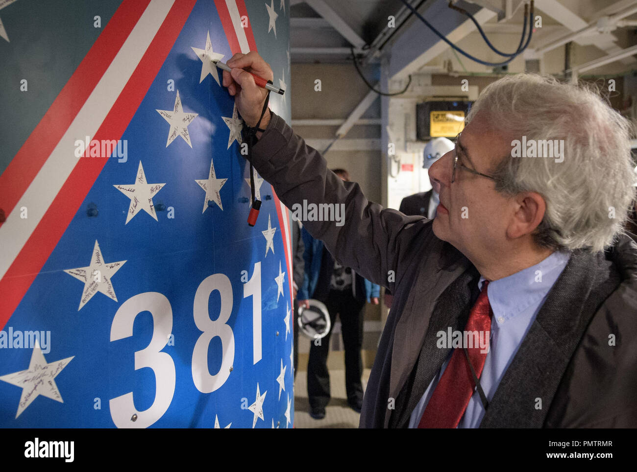 September 13, 2018 - Vandenberg Air Force Base, California, USA - Michael  Freilich, director of NASA's Earth Science Division, NASA Headquarters,  signs a star on the United Launch Alliance Delta II with