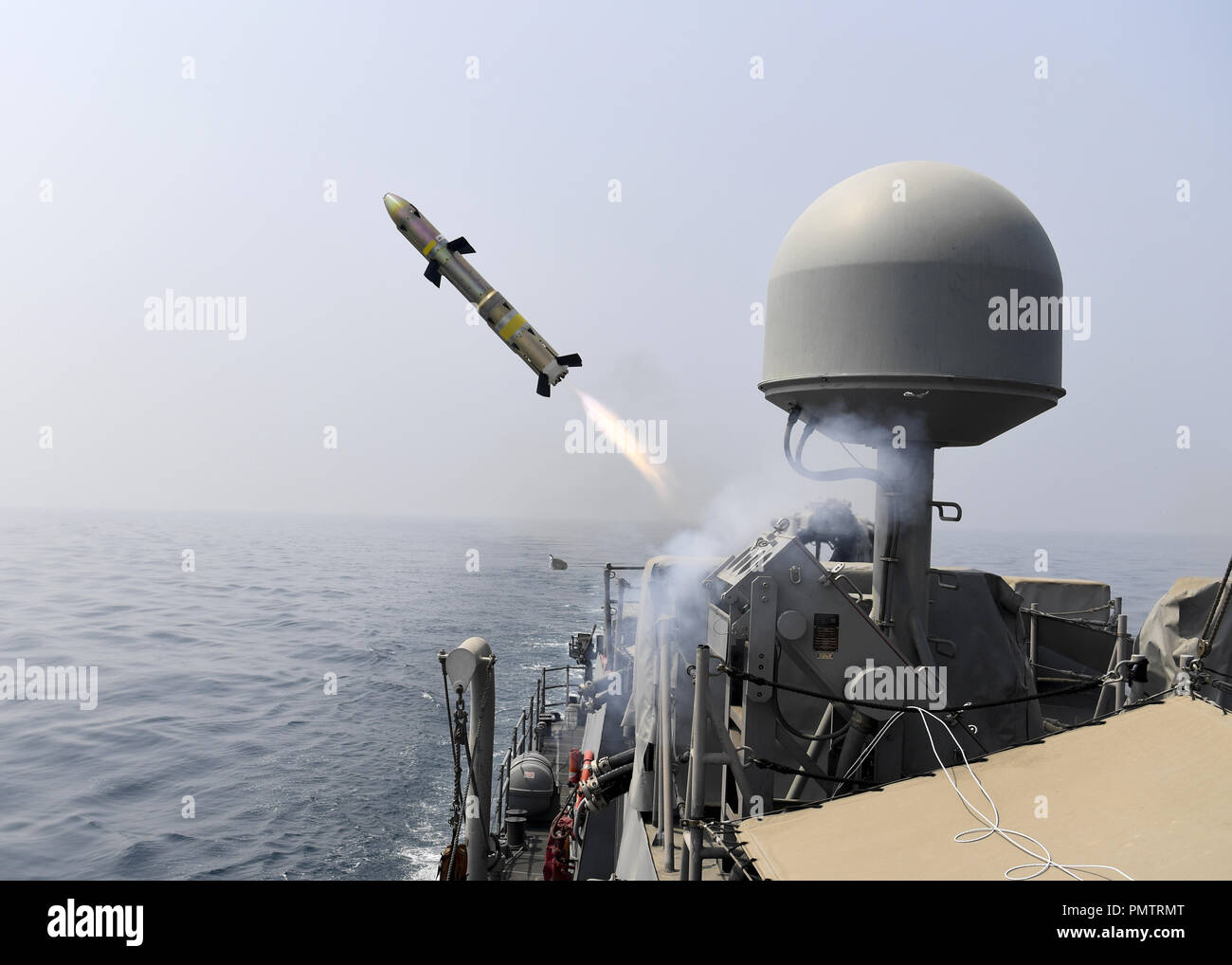 September 16, 2018 - ARABIAN GULF - ARABIAN GULF (Sept. 16, 2018) A MK-60 Griffin surface-to-surface missile is launched from the coastal patrol ship USS Thunderbolt (PC 12). Ships attached to U.S. 5th Fleet's Task Force 55 are conducting missile and naval gun exercises against high speed maneuvering targets to advance their ability to defend minesweepers and other coastal patrol ships. U.S. 5th Fleet and coalition assets are participating in numerous exercises as part of the greater Theater Counter Mine and Maritime Security Exercise to ensure maritime stability and security in the U.S. Centr Stock Photo