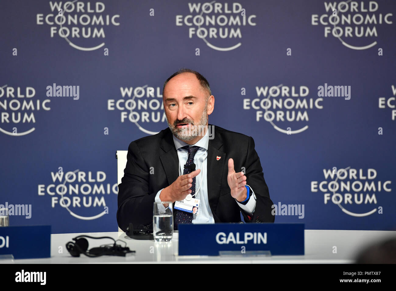 Tianjin, China. 19th Sep, 2018. Simon Galpin, managing director of the Bahrain Economic Development Board, speaks at a press conference on 'the Future of Jobs Report' during the Summer Davos Forum held in Tianjin, north China, Sept. 19, 2018. Credit: Li Ran/Xinhua/Alamy Live News Stock Photo