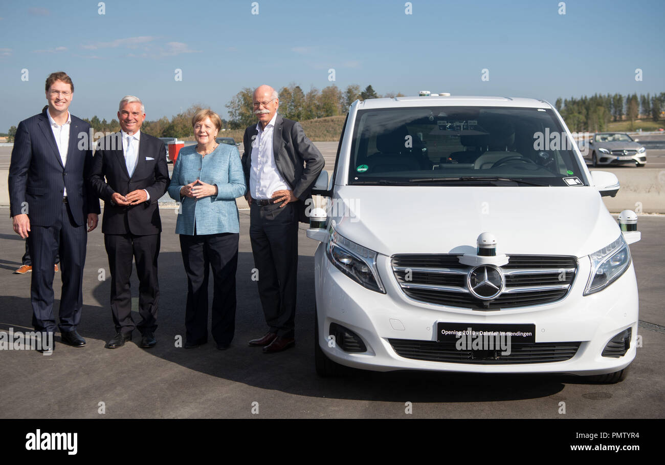 19 September 2018, Baden-Wuerttemberg, Immendingen: Ola Källenius, Member of the Board of Management of Daimler AG (l-r), Thomas Strobl (CDU), Minister of the Interior of Baden-Württemberg, German Chancellor Angela Merkel (CDU), and Dieter Zetsche, Chairman of the Board of Management of Daimler AG, pass a Mercedes-Benz V-Class test vehicle when a new testing and technology center of Daimler AG is commissioned. Photo: Marijan Murat/dpa Credit: dpa picture alliance/Alamy Live News Stock Photo