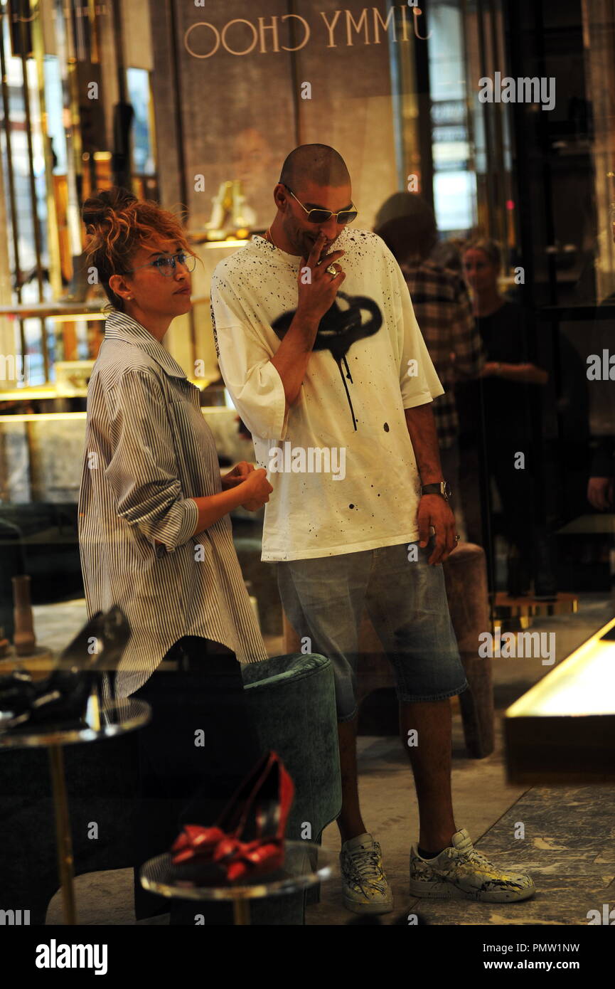 Milan Nina Zilli And Boyfriend Shopping In The Center Nina Zilli Surprised Downtown With Her Boyfriend Omar Hassan While Shopping Here They Are In The Boutique Of Casadei While Nina Zilli Tries