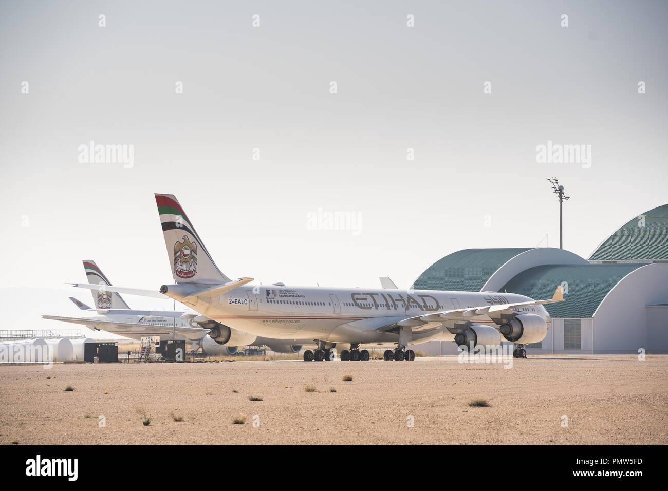 Teruel, Spain. 27th Aug, 2018. An Etihad airline airbus A340 seen parked at Teruel airport.Many people think Teruel airportis an aircraft graveyard where aircrafts go through their final journey and have their metal recycled. In fact this airport located in eastern Spain is more like a hotel for aircrafts to take a long nap. It hosts aircraft from all over the world that have been withdrawn from service, be it temporarily or permanently, and caters to their maintenance needs.Some are ready to fly but are waiting for financial or legal issues to be sorted out. Some are here because their Stock Photo